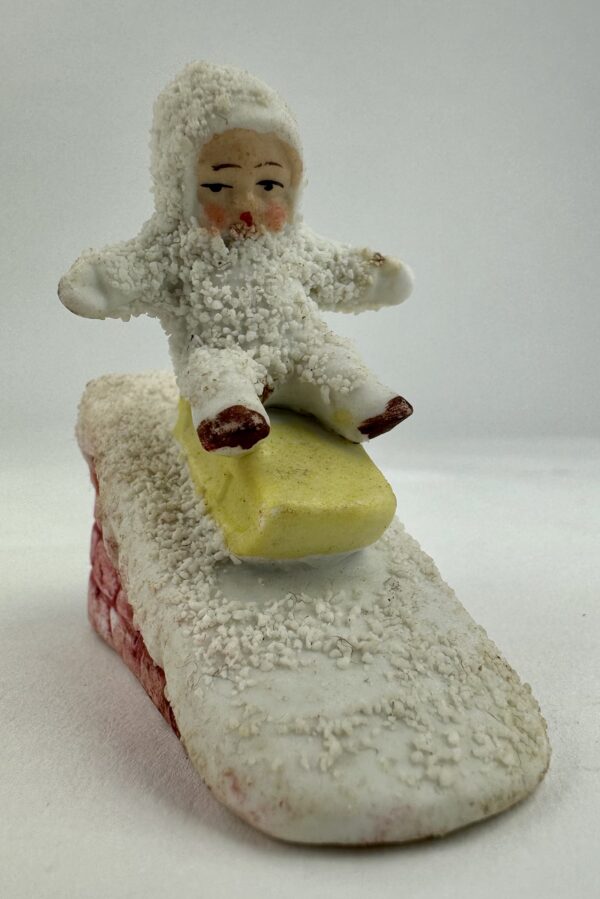 Antique Bisque Snow Baby Sledge